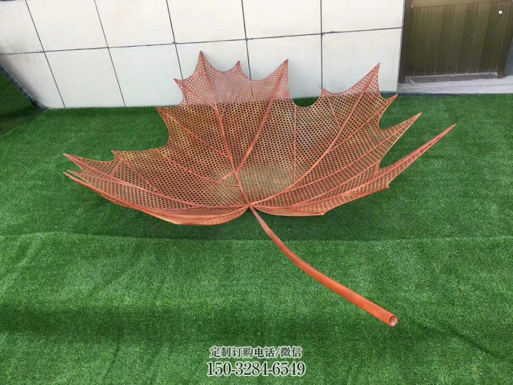 鏤空樹葉雕塑，景區(qū)雕塑，鐵藝樹葉雕塑廠家指用